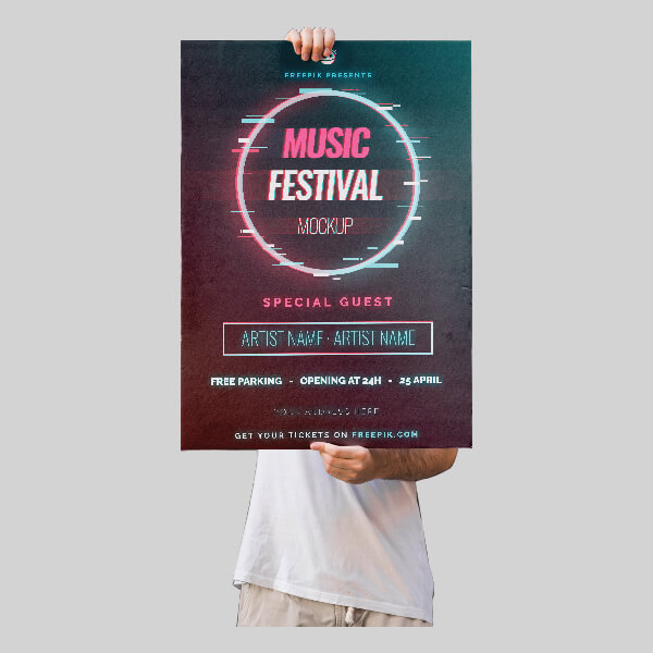 Image of a person holding a poster.