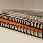 Image of 3 spiral bound books.