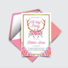 Image of a printed and folded invitation with an envelope.